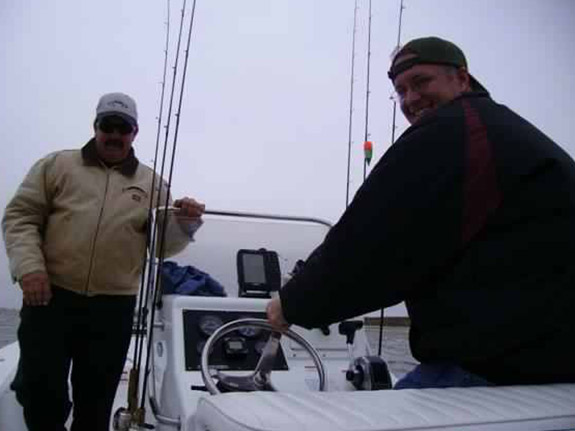 capt warren and client on his boat